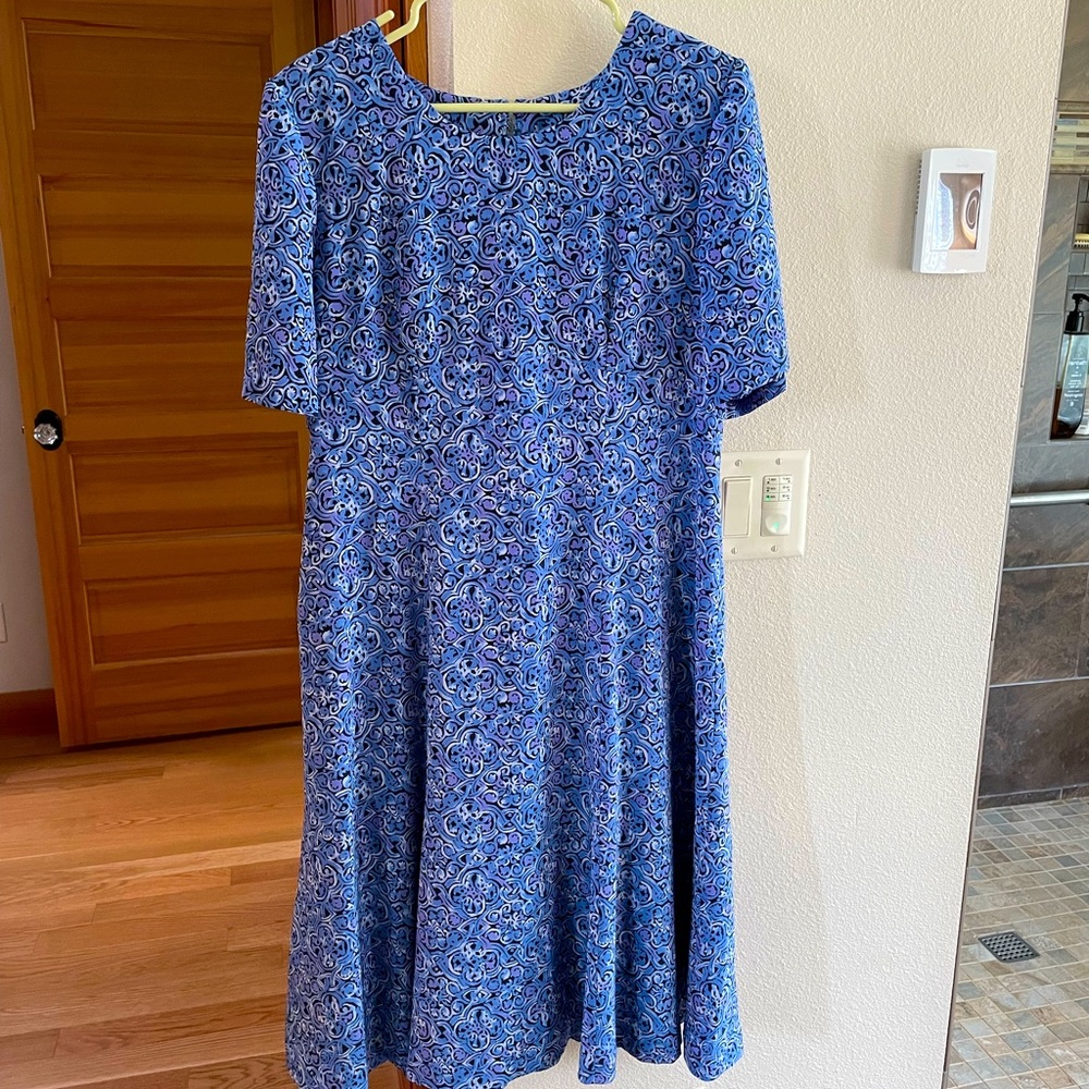 Handmade dress, polyester, and fully lined.